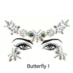 a woman's face with eyelashes and jewels on her eyes, the words butterfly 1 are