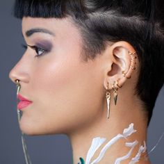 These mini seamless clicker hoop earrings are ideal for stacking on your ears and adding a playful charm. They are also versatile enough to be used for Daith, Rook, and Helix piercings, as well as for use as a nose ring. Metal : 18k Gold Filled Available Sizes: 9mm diameter by 1.25mm thread gauge. 11mm diameter by 1.3mm thread gauge. Sold by the pair. Hypoallergenic jewelry - Nickel Free Water resistant Rigorously manufactured under CA Prop 65 and EU standards Crafted in Brazil Hand Chain Bracelet, 18k Gold Chain, Ear Stack, Hypoallergenic Jewelry, Hand Chain, Triangle Earrings, Cuff Bangles, Anklet Jewelry, Earrings Collection