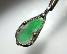 A pendant with a very powerful and mystical aura - its intense color is almost reminiscent of an emerald. - wearable from both sides! - Trust and security! Pendant approx. 35 mm Chrysoprase approx. 26 x 15 x 8 mm Total weight approx. 3.9 g **Used material** chrysoprase Silver wire 935/000 silver plated jewelry pewter Noble handwork - with heart and soul! Silver wire 935/000 serves as the basis - which is soldered with silver-containing soldering tin. Green Amulet Necklace Collectible, Collectible Green Amulet Necklace, Untreated Green Pendant Necklace, Heart And Soul, Silver Plated Jewelry, Heart Soul, Intense Colors, Silver Wire, Art Inspo