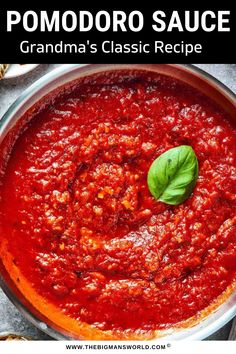 a pan filled with tomato sauce and topped with basil leaves in the top right corner