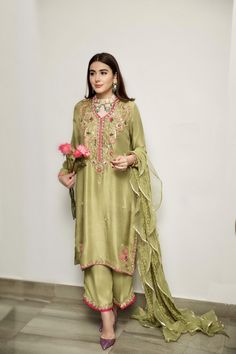 Include: Shirt Trouser Dupatta Fabric: Rawsilk Color: Olive Green Work Technique: Embroidered and Handworked Description: Handworked outfit on rawsilk 3 pcs. This is a 3 Piece stitched outfit Disclaimer: The color of the outfit may vary due to lightening effect of photography Long Frocks For Women, Handwork Design, Plain Suits, Shirt Trouser, Kurta Set For Women, Lehenga Style, Sleeves Designs For Dresses, Purple Outfits, Colour Combo