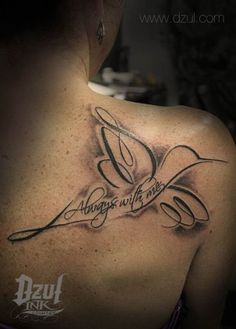 the back of a woman's shoulder with a tattoo saying always with wings on it