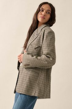 Houndstooth plaid tweed blazer jacket. Lapel collar with buttonhole. One-button front closure. Chest pocket with pocket square detail. Side pockets. Long sleeves with decorative buttons at cuffs. Padded shoulder. Full lining. Loose fit. 89% Polyester, 10% Rayon, 1% Spandex. Imported. Designed in LA. Model wears size S. Tweed Fabric, Decorative Buttons, Tweed Blazer, Black Blazers, Lapel Collar, Pocket Square, Sophisticated Look, Chest Pocket, Blazer Jacket