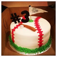 a baseball themed birthday cake in a box