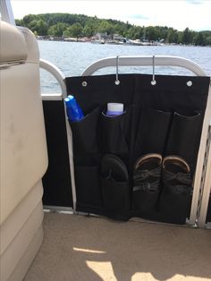 the back end of a boat with two storage pockets