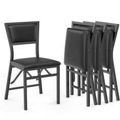 a set of four black chairs sitting next to each other on a white background,