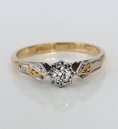 A stunning antique VS clarity diamond ring with a gold band and a superb platinum setting and detailed shoulders. The fabulous diamond is very bright, very fiery and wonderfully clean with excellent VS clarity!! It shimmers and sparkles beautifully in natural daylight and would be perfect as a gift. ▪ Overall Condition: Excellent ▪ Metal: 18ct White Gold & Platinum ▪ Gem: Diamond 0.25ct ▪ Gem Clarity: VS ▪ Gem Colour: H ▪ Ring Size UK: P ▪ Ring Size US: 7.80 ▪ Resizing: Quotation available ▪ Weight: 3.2gms ▪ Marked: Stamped 18ct & PT ▪ Insurance Estimate: £1095 ▪ Payment Layaway Plan Available: Yes ▪ Full Detailed Appraisal: Quotation available As a qualified Gemmologist and Jeweller with over 20 years experience in the jewellery industry, each jewel is chosen for its 'quality, beauty and Victorian White Brilliant Cut Diamond Ring, White Victorian Style Brilliant Cut Diamond Ring, White Single Diamond Jewelry For Anniversary, White Single Diamond Wedding Ring, Diamond White Solitaire Diamond Ring For Marriage, Diamond White Solitaire Ring For Marriage, Art Deco Gold Diamond Ring With Center Stone, Victorian White Diamond Ring With Prong Setting, Solitaire Diamond White Diamond Ring For Marriage