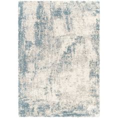 an area rug with blue and white colors