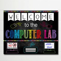 a chalkboard sign that says welcome to the computer lab