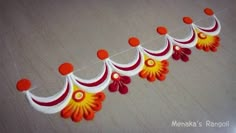 this is an image of paper garlands with flowers on the strings for diwaling