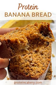 a person holding a banana bread in their hand with the words, protein banana bread