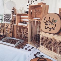 a table topped with lots of wooden items