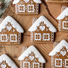 gingerbread cookies decorated with white icing and hearts