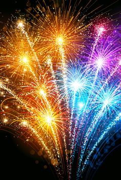 colorful fireworks are lit up in the night sky with bright colors and sparkles on them