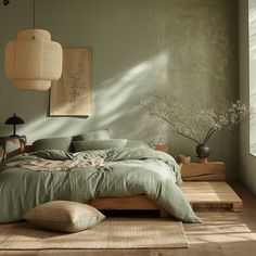 a bed sitting in a bedroom next to a window and lamp hanging from the ceiling