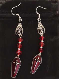 Bat and coffin drop earrings  With 3 red glass beads Earring drop 3 in With either silver plated or sterling silver shepherd hook wires Gothic Red Jewelry For Halloween, Red Gothic Jewelry For Halloween, Nickel-free Vampire Style Dangle Jewelry, Nickel-free Red Halloween Jewelry, Red Nickel-free Jewelry For Halloween, Red Pierced Halloween Earrings, Vampire Style Dangle Jewelry Gift, Vampire Style Dangle Jewelry For Gift, Red Pierced Earrings For Halloween