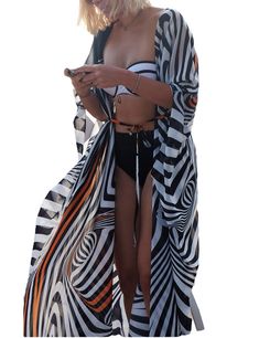 PRICES MAY VARY. Size(inch): Bust:59.05" Waist:59.05" Length:47.24" Sexy kimono with short cut sleeves and open front The long oversize fit looks more stylish and very flowy Suitable for: Party, Daily Wear, Swimming pool, Beach Sheer lightsome chiffon fabric,it's a little bit transparent Bsubseach Womens Chiffon/Rayon Beach Blouses Kimono Cardigan Long Bikini Cover Up 
 Feature:
 Material: Chiffon/Rayon/Lace
 Style: Bohemian
 Sleeve: Long/Half/3/4 Sleeve
 Washing: Hand Wash. Hang to dry.
 Packag Very Short Dress, Beach Blouse, Long Sleeve Kimono, Beach Kimono, Striped Swimsuit, Cap Dress, Long Kimono, Kimono Cardigan, Kimono Dress