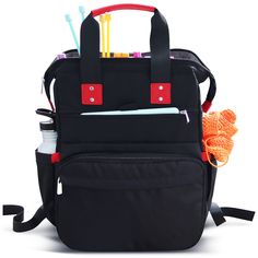 a black backpack filled with pens and pencils