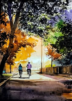 two people riding bikes down the street in front of some trees and watercolors