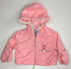 Vintage Pink Baby Jacket with Bunny Applique and Lace trim by Weather Tamer. Condition is "Pre-owned". Small tear in lining. Size 12months. Measurements taken flat. Pit to pit:11” Shoulder to hem:11” Cotton Outerwear With Adjustable Hood For Playtime, Vintage Hooded Hoodie For Spring, Cute Spring Outerwear With Drawstring Hood, Vintage Long Sleeve Hoodie For Spring, Hooded Outerwear With Drawstring Hood For Playtime, Spring Hooded Outerwear For Playtime, Vintage Hooded Spring Outerwear, Vintage Spring Outerwear With Drawstring Hood, Bunny Applique