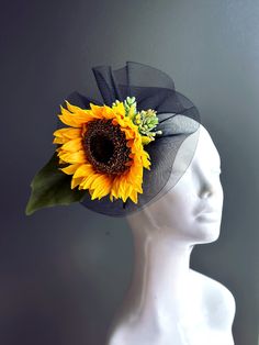 Fascinator with a gorgeous bright sunflower on top of black tulle. Thank you for supporting small businesses and we hope our products bring you and your loved ones Joy & Happiness! S H I P P I N G  -   Last minute masquerade mask shopping? 24 hr processing available. Pick appropriate shipping method and leave us checkout note! 1-2 day guaranteed delivery services also offered, add items to cart and click on shipping tab for rates.  Pls leave a check out note with your need date & contact number Summer Flower Fascinator, Floral Summer Party Costume Hats And Headpieces, Black Mini Hats For Kentucky Derby Garden Party, Black Mini Hats For Kentucky Derby, Black Summer Fascinator For Garden Party, Summer Black Fascinator For Garden Party, Summer Evening Fascinator With Flower Shape, Black Fascinator For Royal Ascot Garden Party, Black Fascinator For Kentucky Derby Garden Party