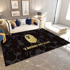 a living room with a couch and rug that says bathing are black on the floor