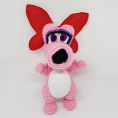 a crocheted pink and white stuffed animal