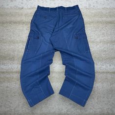 Vintage Red Kap Cargo Pants Navy Blue Baggy Fit Made in USA Flat Front Y2K Skate / Streetwear Great Condition: 9/10 Men's Size:  Waist: 36" Length (inseam): 30" Leg Opening: 9" Thigh Opening: 13" Front Rise: 13" Blue Tapered Leg Cargo Pants, Blue Tapered Leg Cargo Pants With Pockets, Denim Blue Tapered Leg Cargo Pants, Vintage Blue Cargo Jeans With Pockets, Vintage Blue Cargo Jeans, Blue Relaxed Fit Cargo Jeans With Pockets, Retro High Waist Cargo Jeans With Pockets, Retro High Waist Cargo Jeans, Retro High-waist Cargo Jeans With Pockets