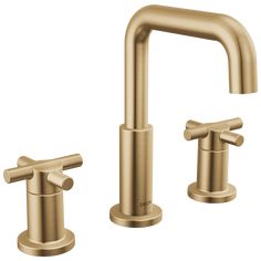 two faucets in brushed brass, one with the handles down and three without