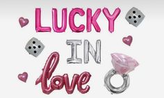 the words lucky in love are surrounded by balloons and dices on a white background