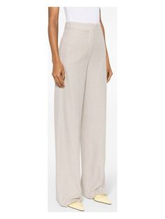 If you're after a stylish blend of comfort and elegance, these pants are your new go-to. Imagine walking on a beach with a gentle breeze while still looking chic and put-together. Simply put, it's like luxury loungewear that’s ready for the runway. Color: Sand Beige Material: 100% Cotton Jersey High Waist for a flattering fit Floor-length wide leg for a dramatic flair Concealed front button, hook, and zip fastening for a sleek look Two side slash pockets for convenience Pressed crease for a poli Luxury Loungewear, Loungewear Luxury, Color Sand, Sand Beige, Sleek Look, Wide Leg Trousers, Womens Backpack, Floor Length, Wide Leg