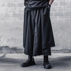 "Funa" Techwear Skirt: Unleash Your Style Dive into the avant-garde world of techwear with the "Funa" Skirt. It’s not just about fashion—it’s about making a statement. Edgy yet elegant, this skirt is for those who dare to defy expectations and embrace their unique style. A Symphony of Function and Flair Every inch of the "Funa" tells a story of innovation. It’s a garment that captures the essence of movement and versatility, designed for the urbanite who craves freedom and expression in their wa Avant-garde Black Bottoms For Spring, Winter Black Asymmetrical Skirt, Black Asymmetrical Skirt For Winter, Black Avant-garde Bottoms For Spring, Black Cyberpunk Winter Bottoms, Punk Asymmetrical Skirt For Alternative Fashion, Edgy Spring Bottoms For Cosplay, Edgy Spring Cosplay Bottoms, Black Winter Streetwear Skirt