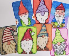 six gnome coasters with different designs on them