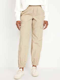 elastic-drawstring waist faux fly front pockets flap-cargo pockets at thigh side-zip hem elasticized cuffs sits at belly button loose hip and thigh tapered leg hits at ankle 29" regular inseam 27" petite inseam 32" tall inseam models are approx.  5'9" and wear sizes s (4), l (12), and xl (18)machine wash according to the care instruction label Quilted Clothing, Cargo Joggers, Joggers Womens, Old Navy Pants, Old Navy Women, Navy Pants, Bottom Clothes, Belly Button, Jogger Pants