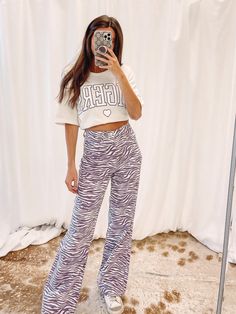 - 100% Cotton - Purple printed denim pants - 29" inseam - Waist Measurements: XS - 24" waist, S - 26" waist, M - 27" waist, L - 29" waist - Model is pictured in a size extra small Purple Tiger, Printed Denim Pants, Pants Large, Printed Denim, Tiger Print, Denim Pants, Two Piece Pant Set, Purple, Pants