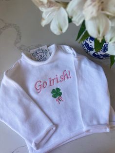 Our preppy, rollneck sweaters are the perfect canvas to design a personalized game day sweater! It looks adorable with a name or monogram. Want to make it extra special? Ask to include a motif, like shamrocks, the possibilities are endless! As always, please message me to make a custom design for you! I can also make these on a dress or long sleeve shirt. Classic Winter Sweater With Letter Print, Classic Winter Letter Print Sweater, Classic White Sweater With Embroidered Logo, Classic White Letter Print Sweater, Classic White Sweater With Letter Print, White Embroidered Logo Sweater For Fall, Customizable Cotton Fall Sweater, Customizable Cotton Sweater For Fall, Preppy Cotton Winter Tops