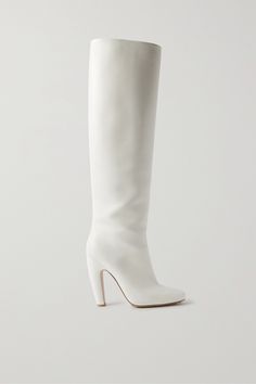 A standout at Bottega Veneta's Fall '22 show, these knee boots are beautifully constructed from soft leather with just the right amount of slouch. Take a styling cue from the runway and pull yours on with something midi in length. Elegant White Leather Knee-high Boots, Elegant White Leather Platform Boots, Luxury Platform Boots With Sculpted Heel, Luxury Calf Leather Knee-high Boots, Fitted Luxury Platform Boots With Sculpted Heel, White Leather Knee-high Boots For Formal Occasions, Formal White Leather Knee-high Boots, Luxury Calf Leather Knee-high Evening Boots, Luxury Calf Leather Knee-high Boots For Evening