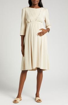 Ideal for pregnancy and beyond, this charming fit-and-flare dress features a bump-friendly Empire waist and a front-zip panel for easy nursing access. 42 1/2" length Back zip closure; hidden front-zip closure Jewel neck Three-quarter sleeves Side-seam pockets Unlined, with padded shoulders 100% Tencel® lyocell Tencel lyocell is a sustainably produced fiber made with closed-loop processing Hand wash, dry flat Imported Hispanic & Latinx Owned/Founded Nursing Friendly Fitted Knee-length Dress, Knee-length Fitted Nursing-friendly Dress, Fitted Beige Maternity Dress, Empire Waist Maternity Dress, Nursing Friendly, Fitted Cream Maternity Dress, Nursing Friendly Empire Waist Maternity Dress, Nursing Friendly Maternity Dress With Empire Waist, Nursing-friendly Knee-length Maternity Dress, Nursing Friendly Knee-length Maternity Dress