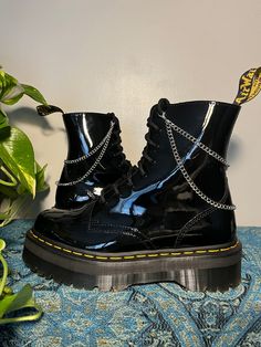 Lunar Lotus Boot Chains are the perfect way to spice up your Doc Martens or Combat Boots!  The chain length fits both Platform and Classic heel heights - Each order comes with a set of two chains of the same style - Each set is handmade. *New* Heavy Gauge Chains with detachable charms for easy mixing and matching! This Set Includes: - Clips: 14mm Silver Plated - Chain: Nickle - Fittings: Silver Plated Boot Chains, Preppy Shoes, Wrap Boots, Classic Heels, Star Gift, Shoe Clips, Same Style, Doc Martens, Platform Boots