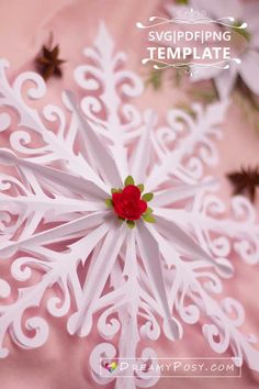 a paper snowflake with a red rose on it and the words, wrapping template