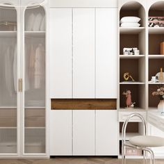 a white closet with glass doors and shelves