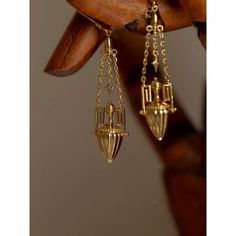 "Embrace timeless elegance with our stunning gold-plated earrings inspired by Greek and Roman artistry. These exquisite pieces feature hanging gold balls reminiscent of elongated forms found in Art Deco and a touch of the intricate patterns seen in Hurufiyya art. Channel the grandeur of Anglo Gothic design and adorn yourself with a touch of history. ✨ Real 22k gold multiple layers plated. Anti tarnish, Waterproof, Water resistance Luxury Gold Plated Ceremonial Jewelry, Luxury Traditional Baroque Earrings, Engraving Rings, One Thousand And One Nights, Thousand And One Nights, Gold Bottle, Ear Drop, Look Boho Chic, One Thousand