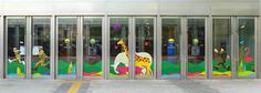 the glass doors are decorated with colorful images