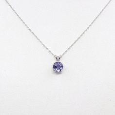 --- Handmade in the United States--- Made to Order--- Metal: Solid 14K Gold (White, Rose, Yellow Gold)--- Pendant Size:12 x7mm--- 100% Real Natural Tanzanite--- Stone Size: 7mm--- Stone Shape: Round--- Total Carat Weight: Approx 1.3ct--- Solid 14k Italy Rolo Chain 1.0mm◈ 18K & Platinum Available upon request -- please contact us! ◈ White Gold Round Tanzanite Necklaces, Anniversary Tanzanite Necklace With Brilliant Cut, Classic Tanzanite Necklace With Diamond Cut, Classic Tanzanite Necklaces With Diamond Cut, Tanzanite Round Necklaces For Anniversary, White Gold Tanzanite Necklace For Anniversary, Classic Tanzanite Necklace With Brilliant Cut, Anniversary White Gold Tanzanite Necklace, Tanzanite Pendant Necklace With Brilliant Cut