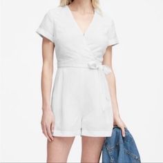 White Romper Perfect For A Bridal Shower, Summer Picnic, Bachelorette Party. Linen, Wrap, Tie Waist, V-Neck With Clasp, Cuffed Short Sleeve Condition: New With Tags Length 30 Pit To Pit 17 Waist 28 Inseam 3.5 Fitted White V-neck Jumpsuits And Rompers, White Cotton V-neck Jumpsuits And Rompers, White Cotton V-neck Jumpsuit, White V-neck Jumpsuit With Tie Waist, Fitted White V-neck Jumpsuit, White Fitted V-neck Jumpsuit, White Short Sleeve Jumpsuits And Rompers For Work, White V-neck Jumpsuits And Rompers For Brunch, White Tie Waist Jumpsuit For Day Out