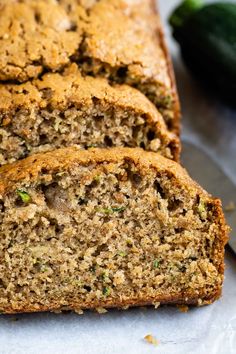 two slices of zucchini bread sitting on top of each other