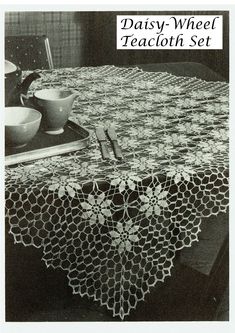 an image of a table with doily on it