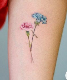 two flowers on the left side of the thigh, one pink and one blue flower