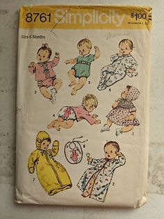 an old sewing book with baby's clothes on it