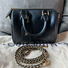 $3150f&Fthis Is A Discontinued Louis Vuitton Speedy Bb Ink Noir In Lamb Skin Leather W/Light Ghw. It’s In Like New Condition And Wonderful Throughout. Made In Italy Fo3260. It Comes With A Detachable Shoulder Strap, Tag, Textile Card, Dust Bag/Shopping Bag As Seen On The Listing Noir Color, Louis Vuitton Speedy, Last Call, Authentic Louis Vuitton, Louis Vuitton Bag, Dust Bag, Shoulder Strap, In Italy, Bag Lady